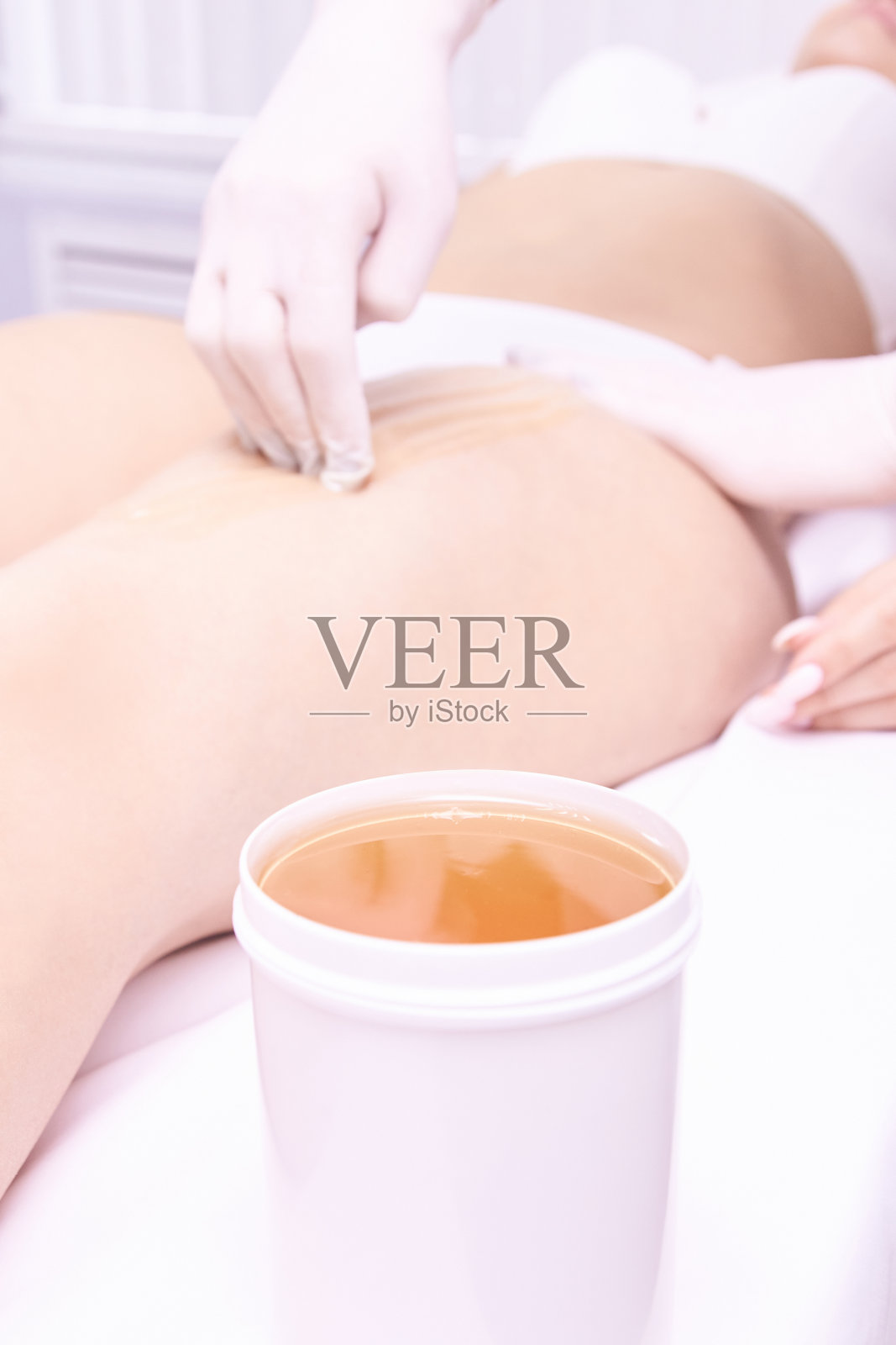 脱毛。整容手术。美丽和健康。明亮的皮肤照片摄影图片