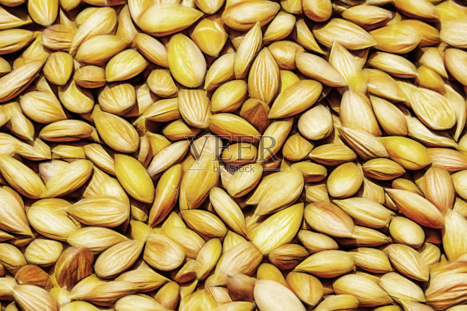 关闭干果杏仁照片摄影图片