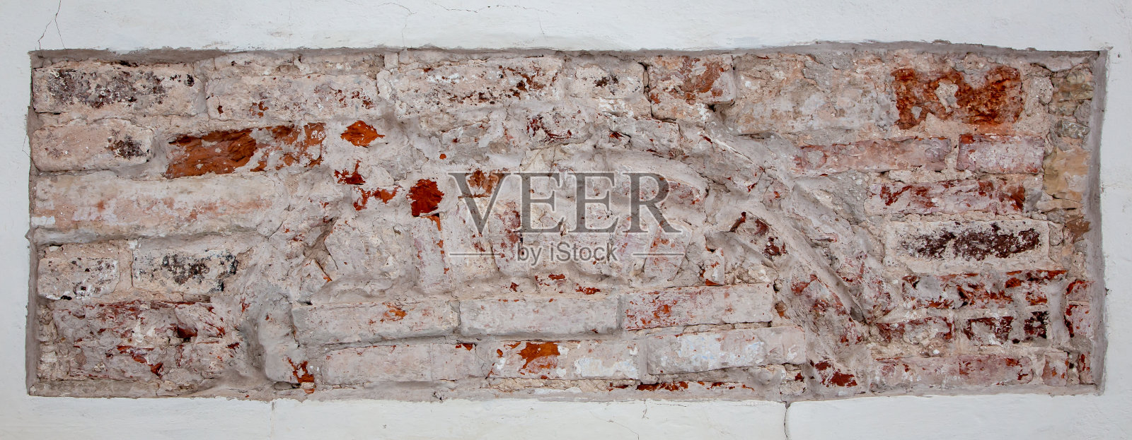 粗糙的古老的砖石。旧砖块的背景。照片摄影图片