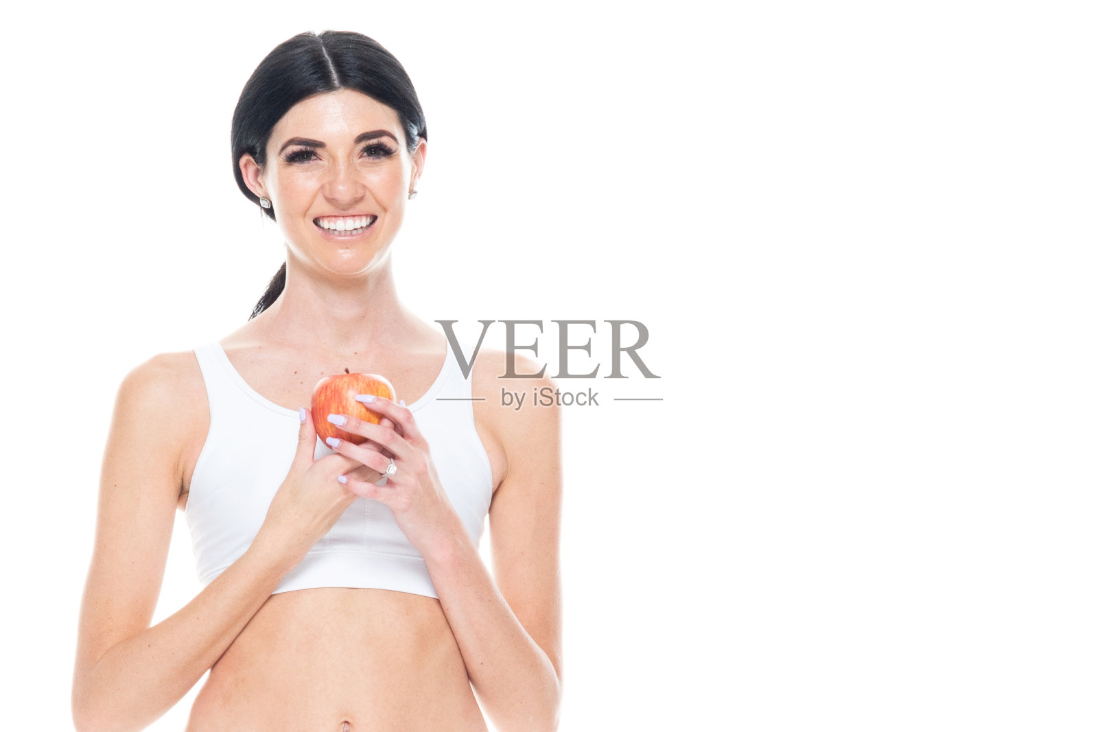 美丽的女性，长发，穿着运动服照片摄影图片