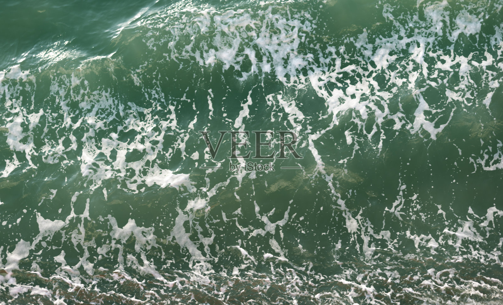 俯视图的照片海浪，背景为网站与空间。照片摄影图片