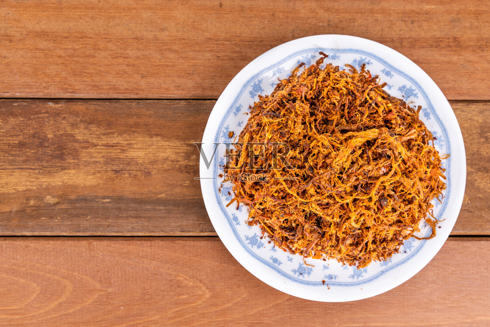 牛肉或鸡肉制成的干肉松照片摄影图片