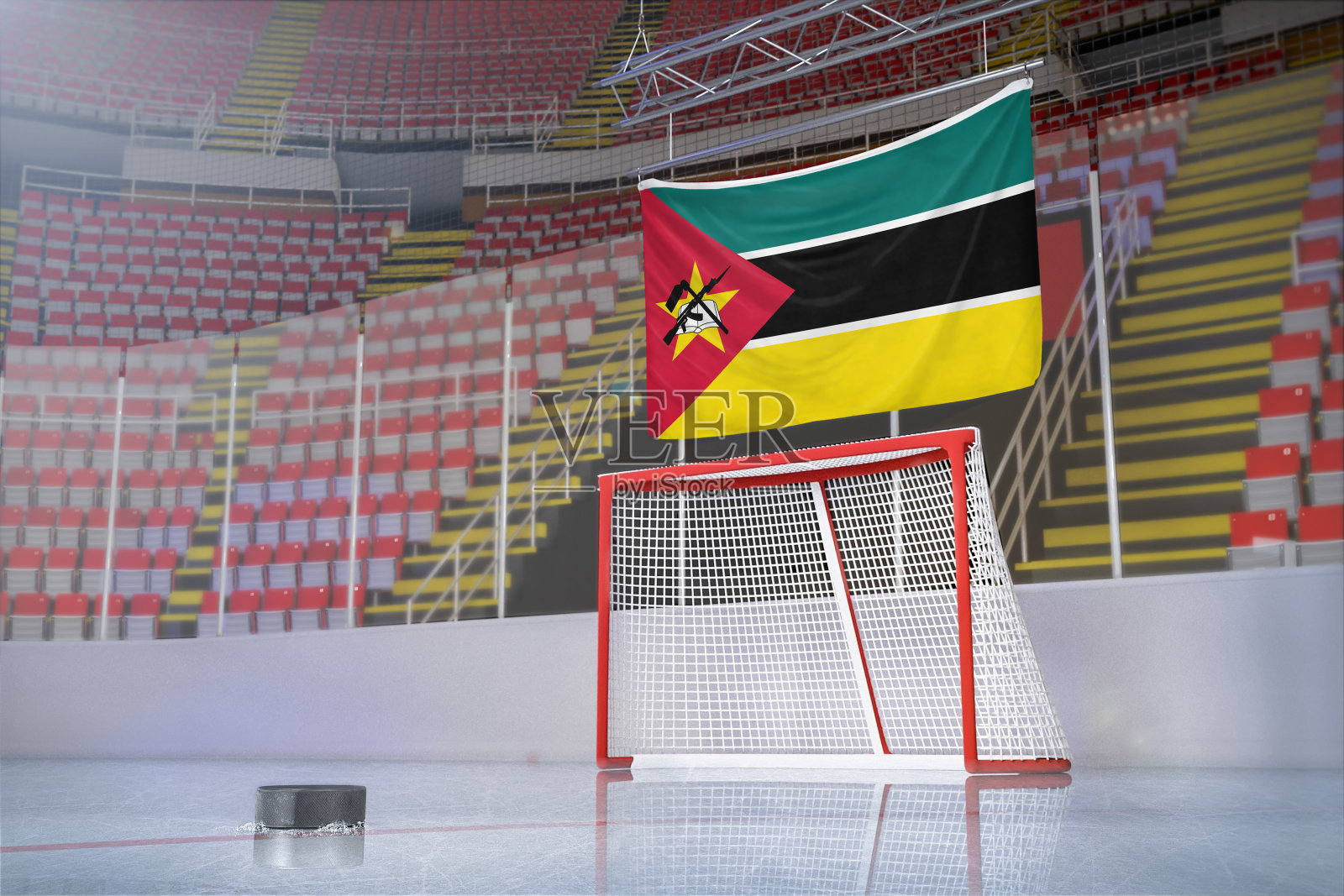 曲棍球场上的莫桑比克国旗，有冰球和球网照片摄影图片