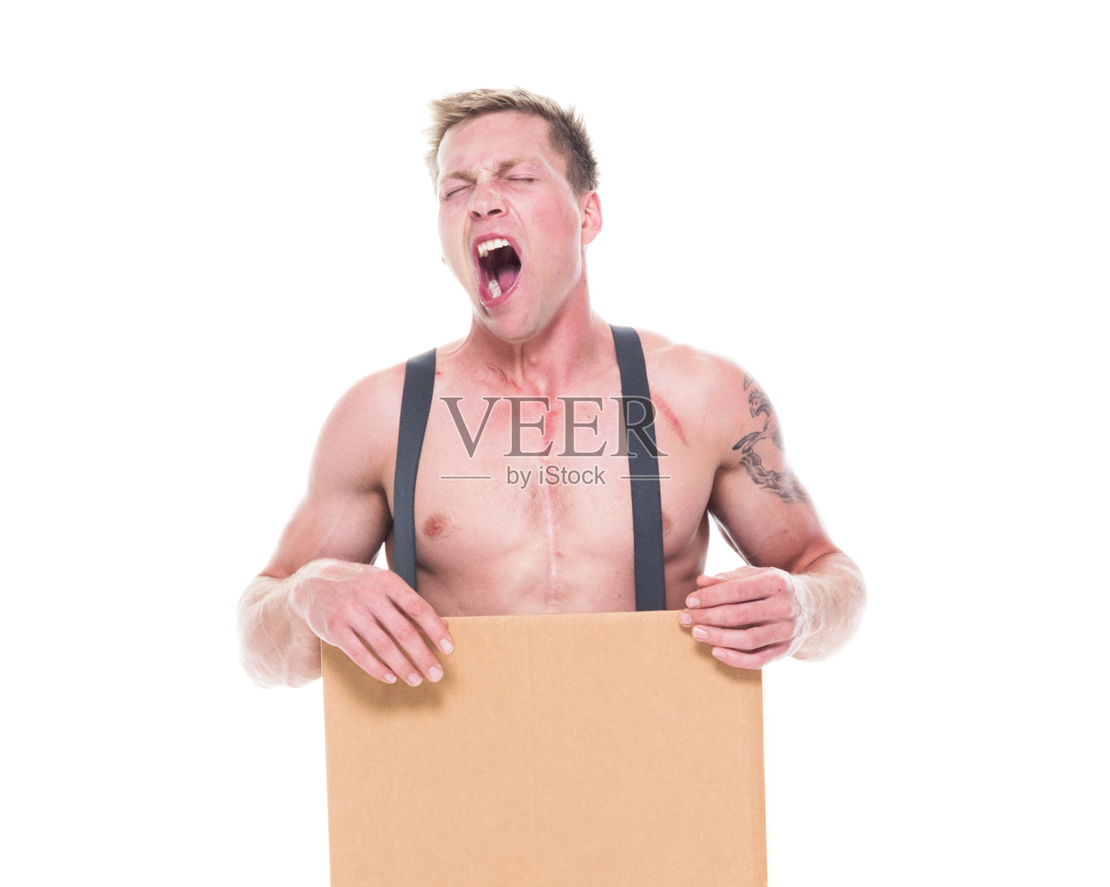 困在箱子里的穷人累了照片摄影图片