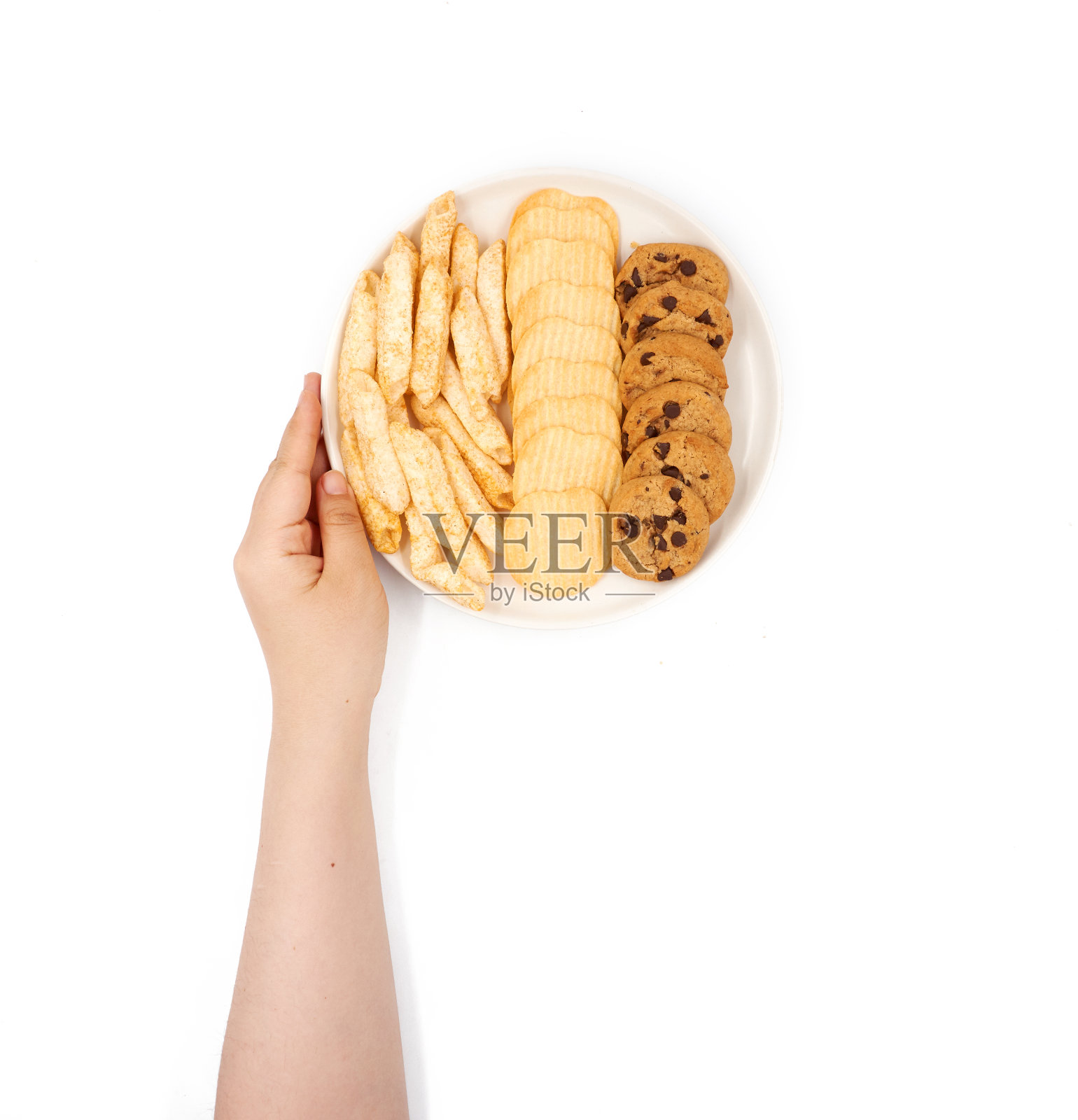 白色背景下的女性手握薯条照片摄影图片