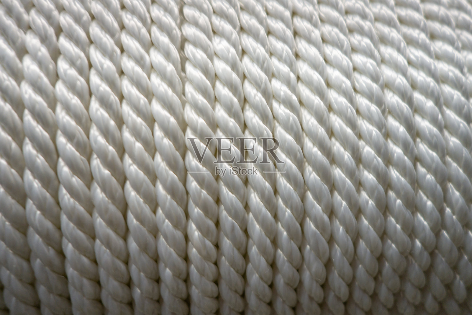 创意背景来自尼龙和钢绳，绳索和链条。照片摄影图片