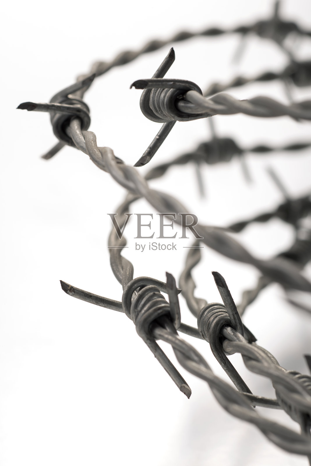 有刺的铁丝具有选择性聚焦照片摄影图片