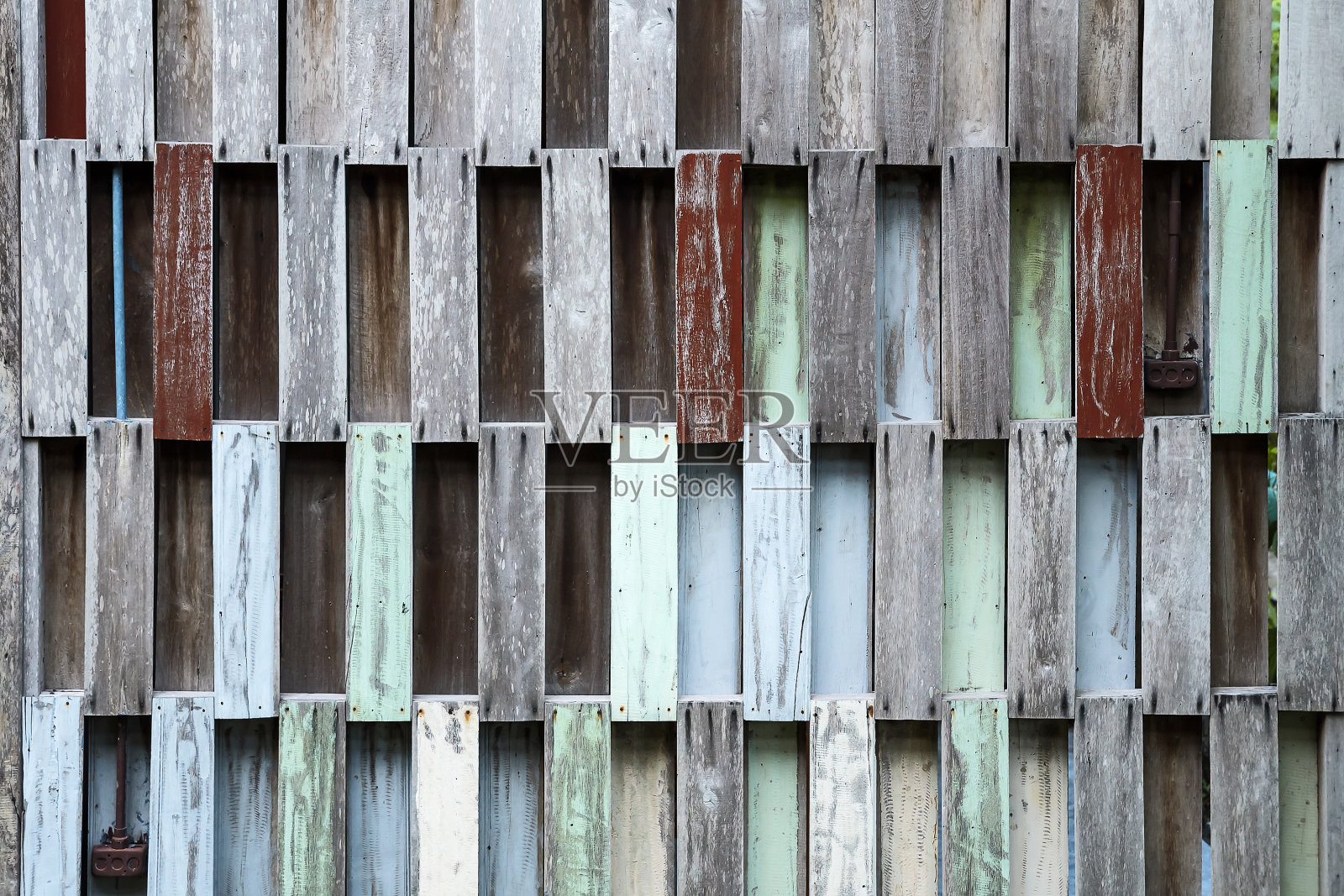 回收木托盘墙。照片摄影图片