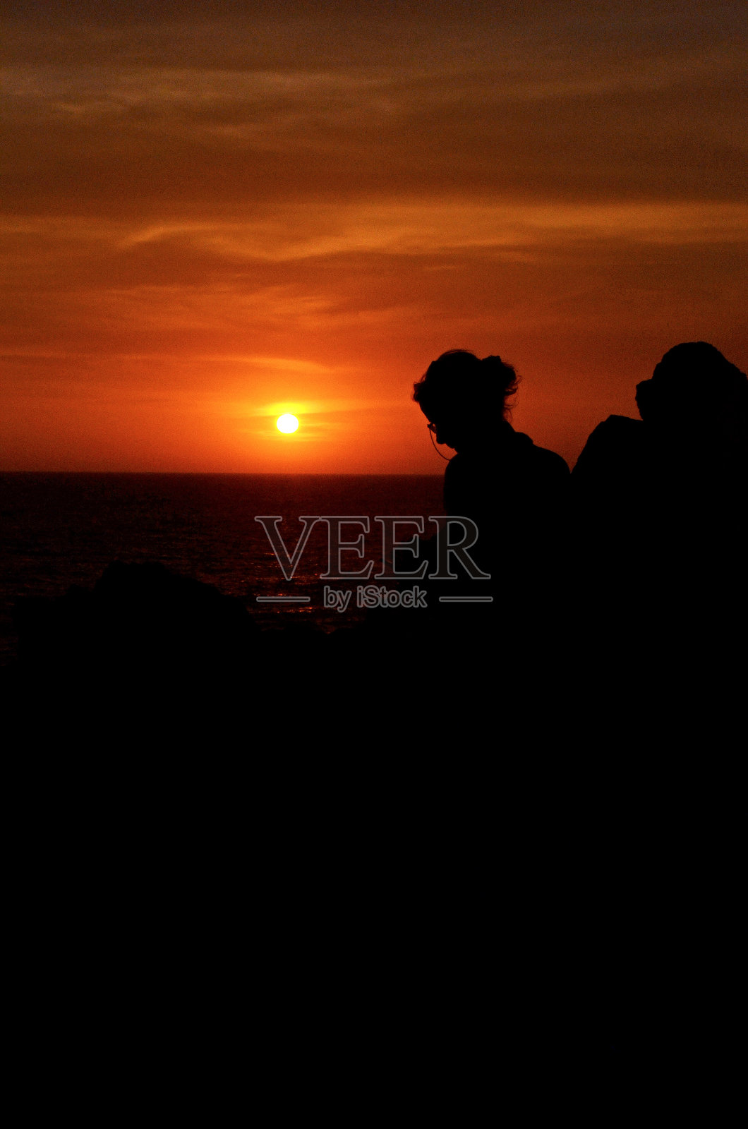 日落秘鲁天空云彩太阳地平线剪影海洋海滩照片摄影图片