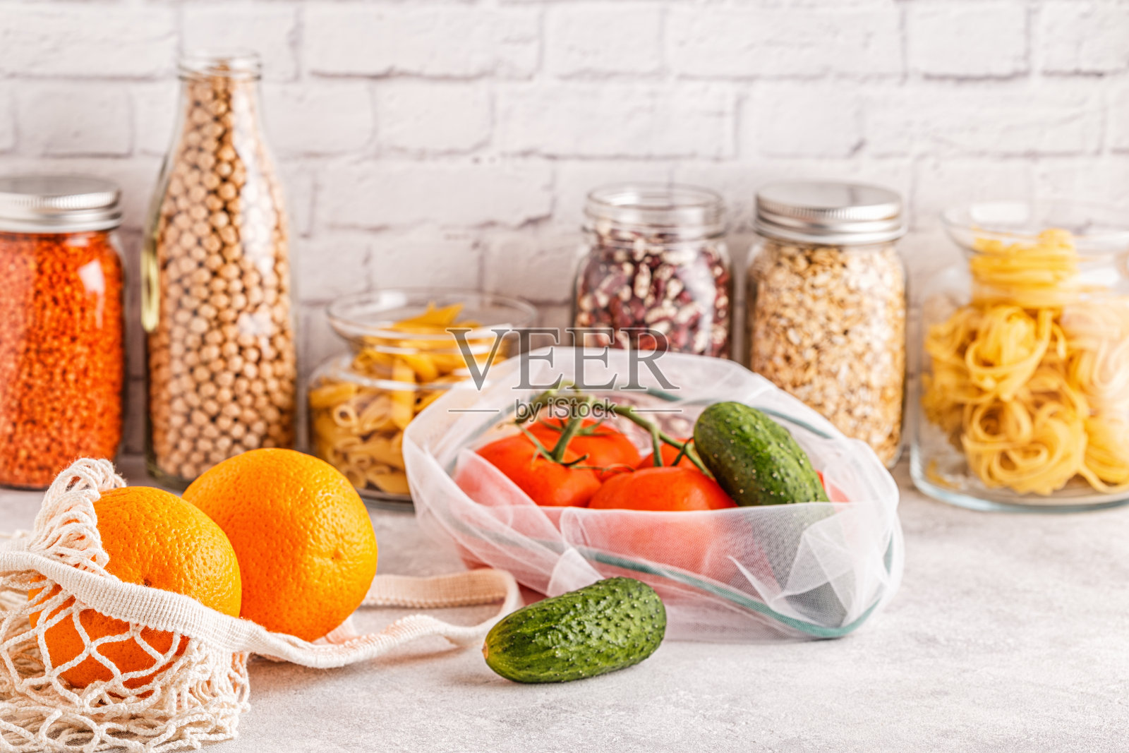 产品在纺织袋，玻璃器皿。环保购物和食物储存照片摄影图片