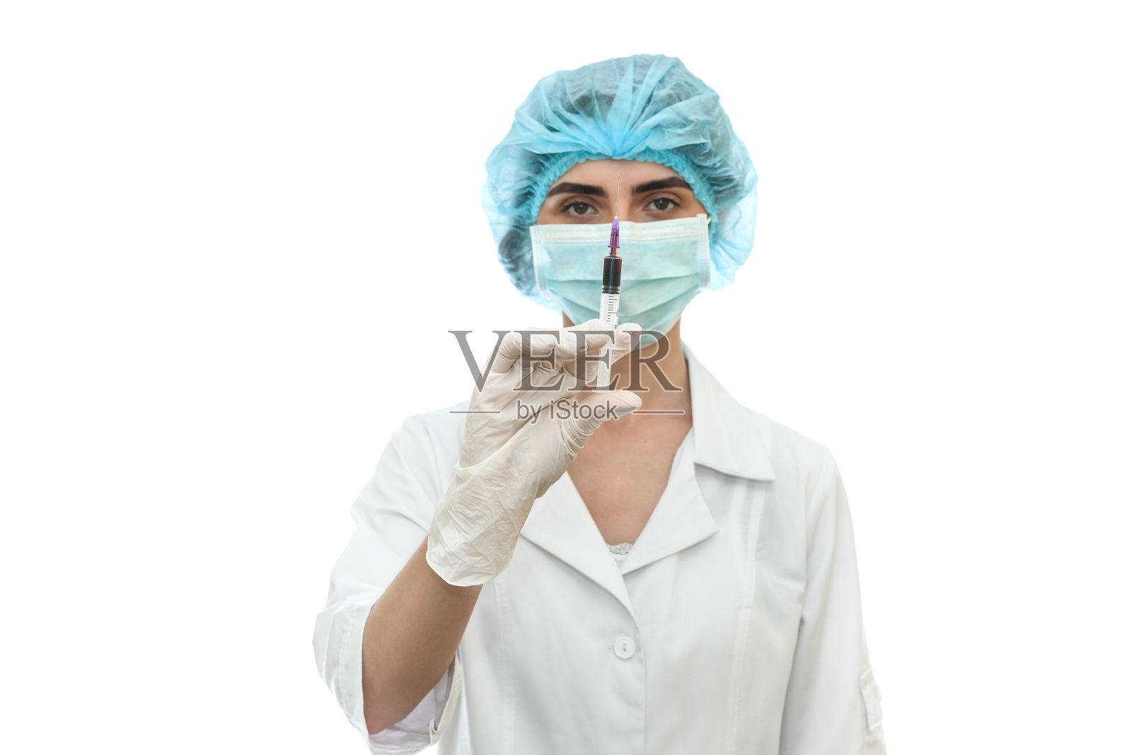 医生在口罩与注射器隔离白色照片摄影图片