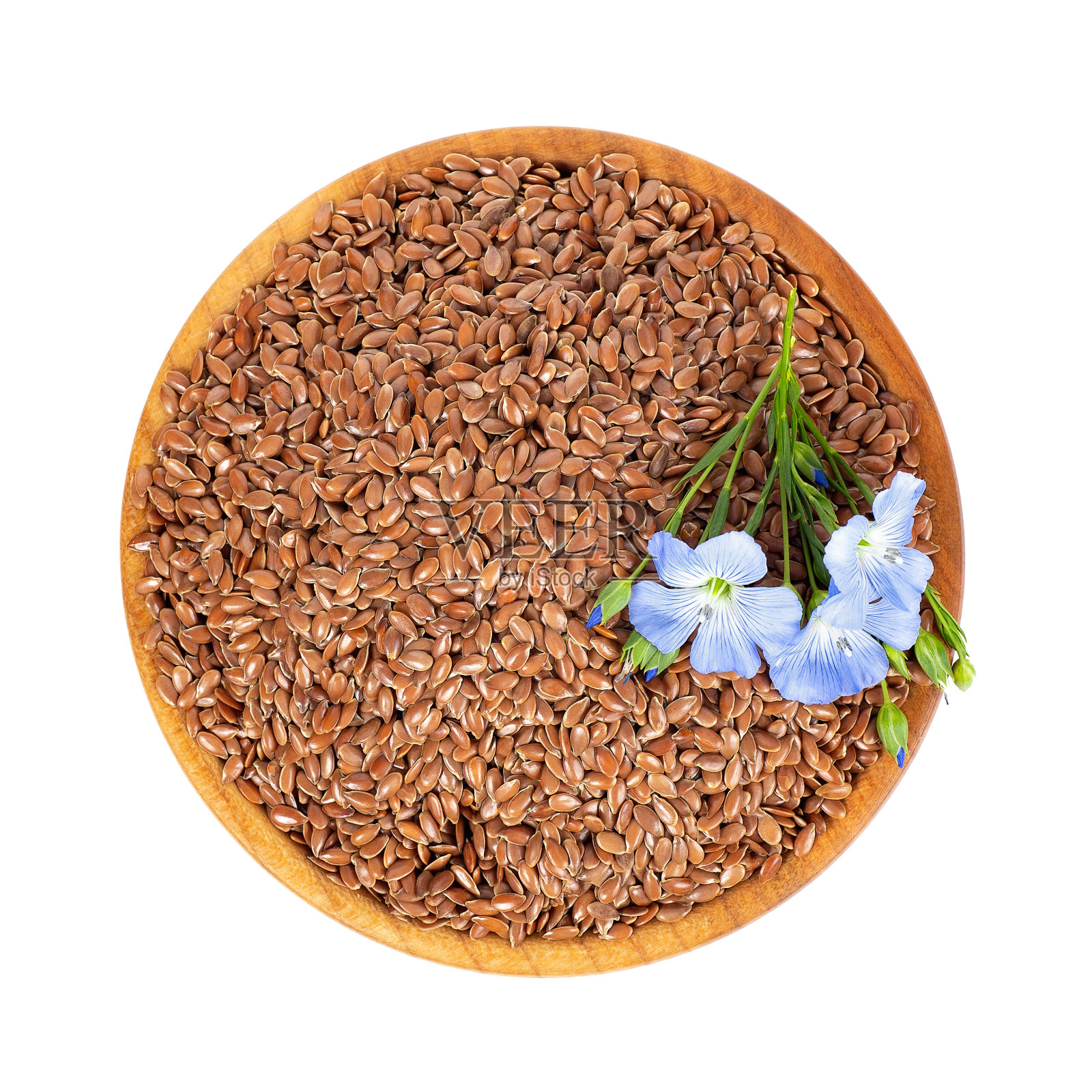 碗里的亚麻籽和花照片摄影图片
