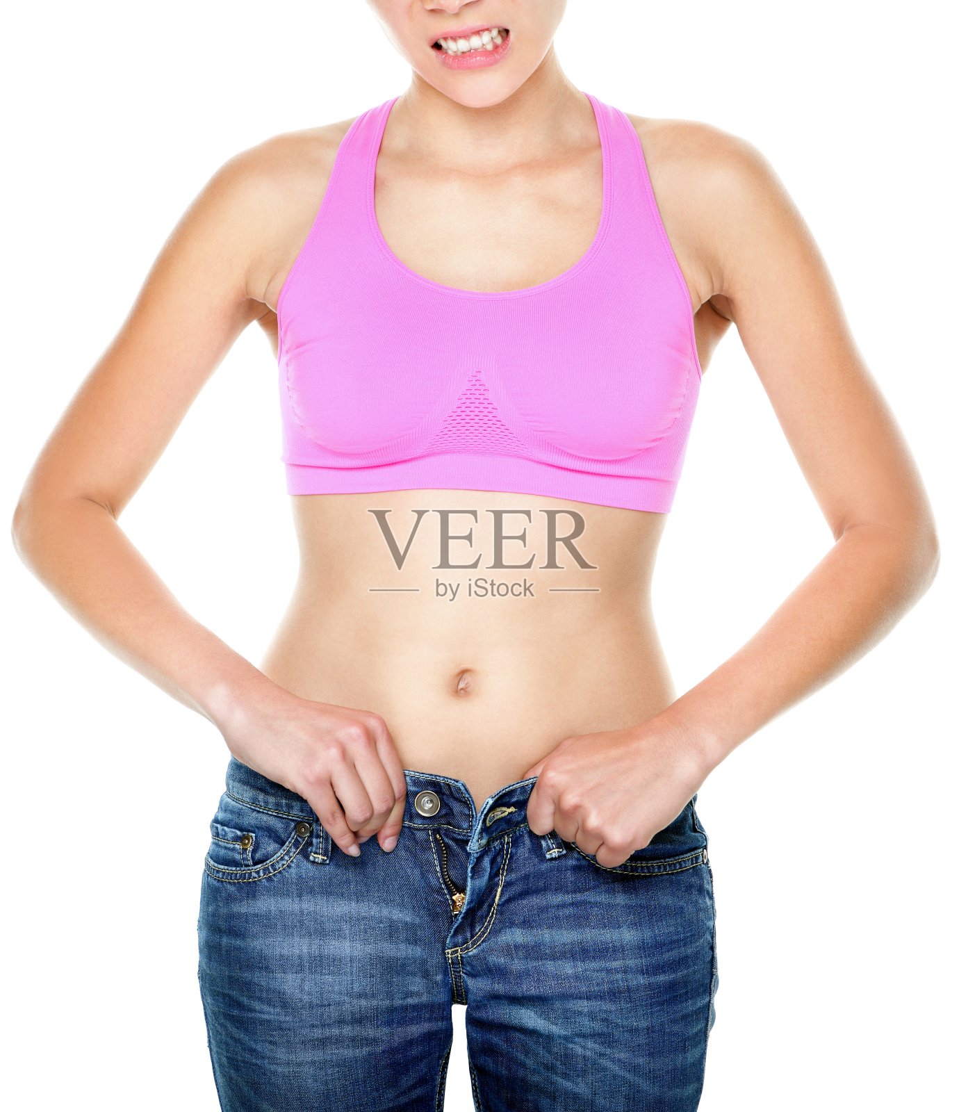 体重增加和减肥的女人扣裤子照片摄影图片