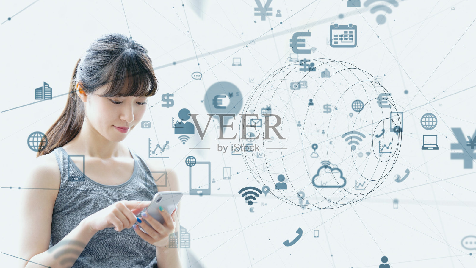 物联网概念。一个用智能手机的亚洲女孩。照片摄影图片