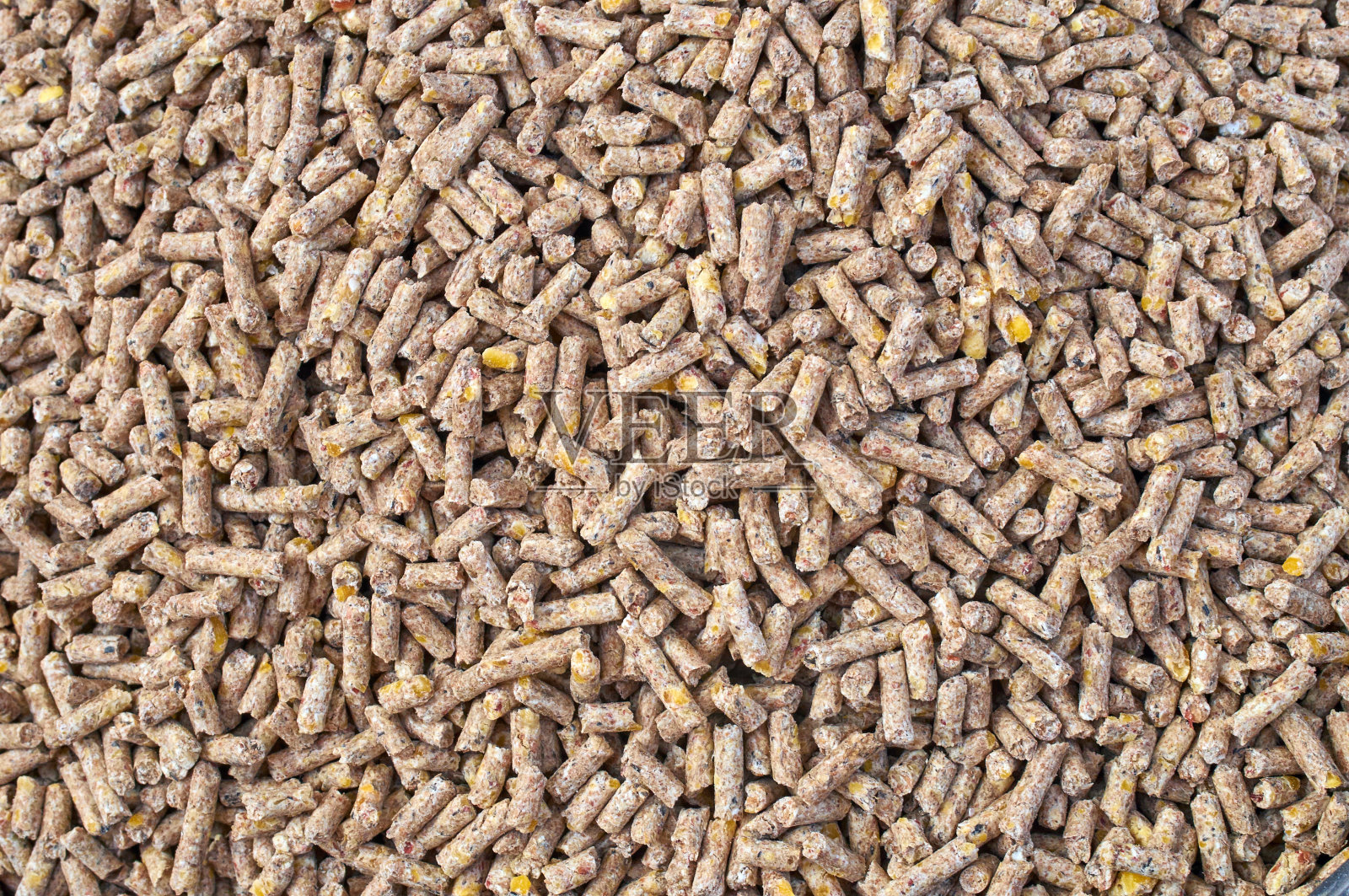 用于牲畜和鸟类饲料的碾碎种子和谷物混合物的背景纹理照片摄影图片