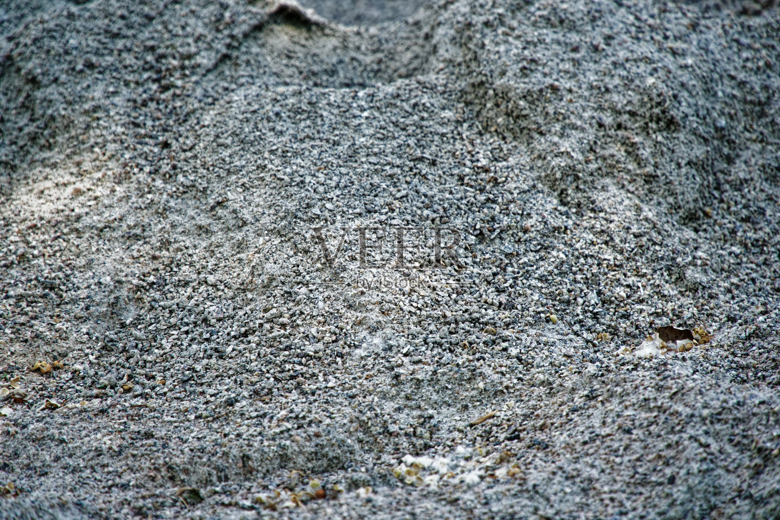 路面砾石、砂石和花岗岩砾石质地。碎砾石背景。堆石纹理。工业煤照片摄影图片
