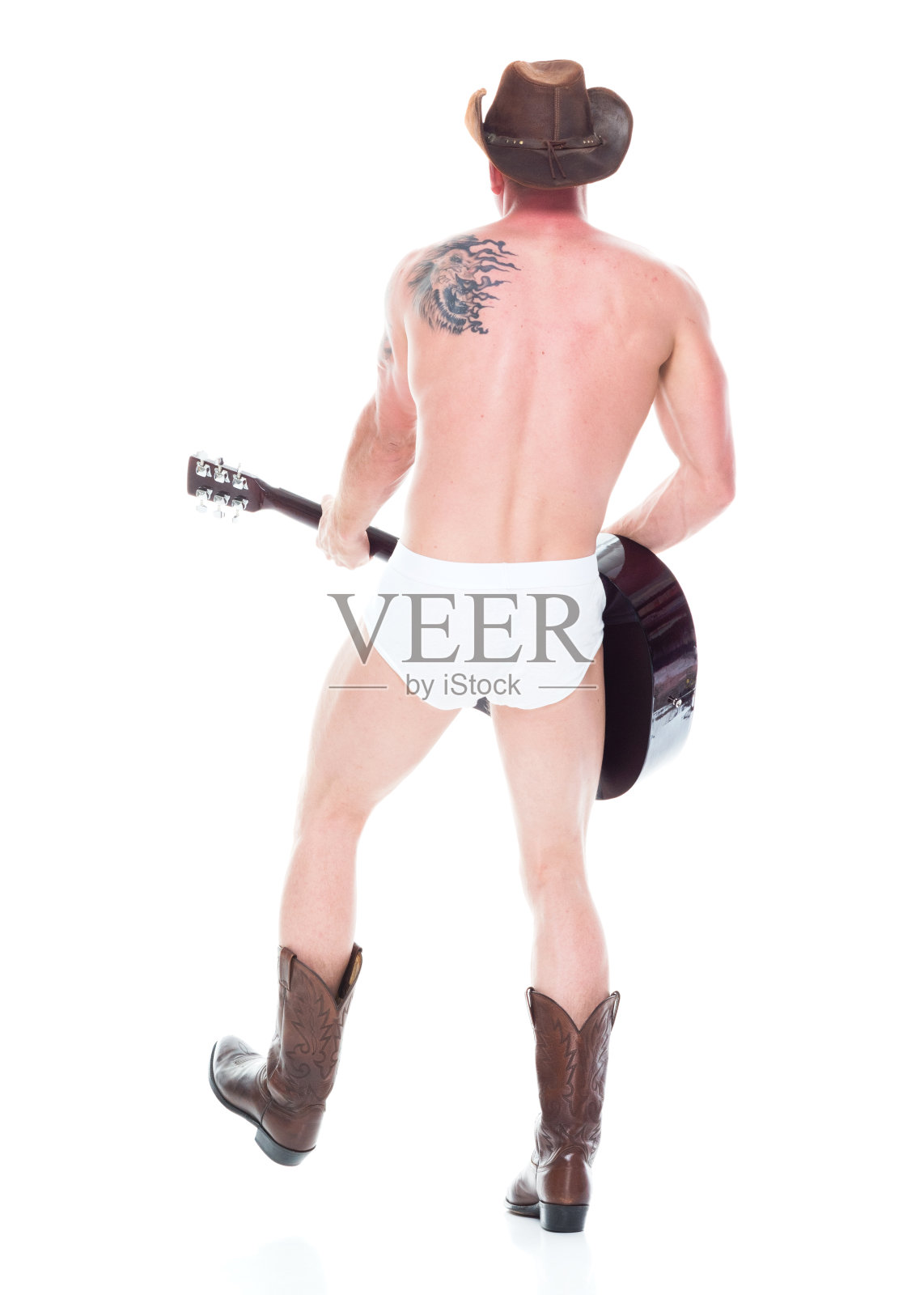 性感牛仔在内衣里弹吉他的后视图照片摄影图片