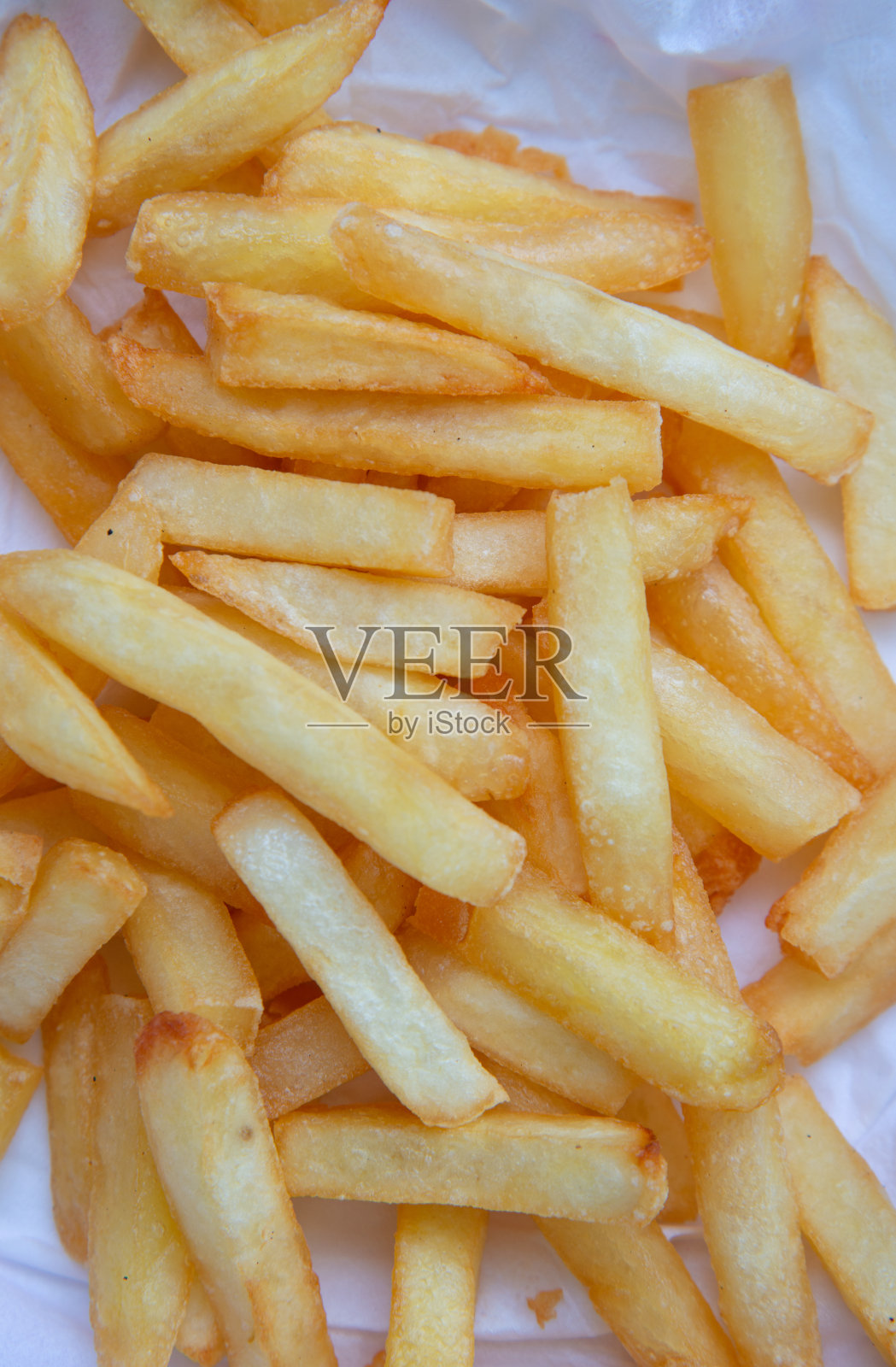 炸薯条的背景，特写镜头。照片摄影图片