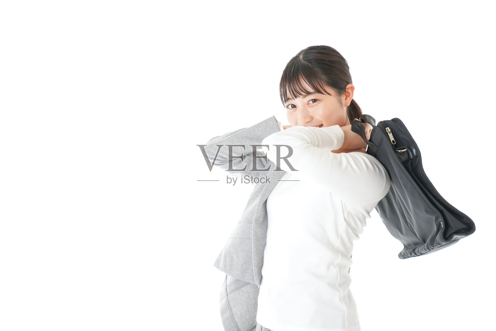 年轻的职业女性外出参加销售活动照片摄影图片