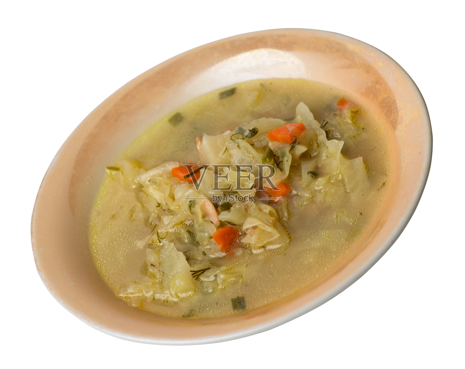白菜汤在盘子上孤立的白色背景。素食汤的汤。健康食品上照片摄影图片
