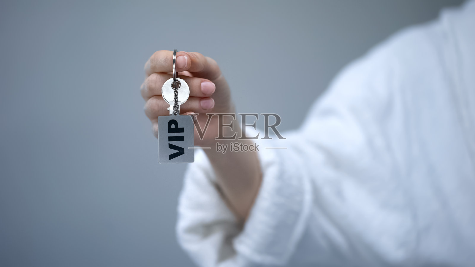 钥匙链亲临贵宾，为富有客户打造奢华度假胜地照片摄影图片