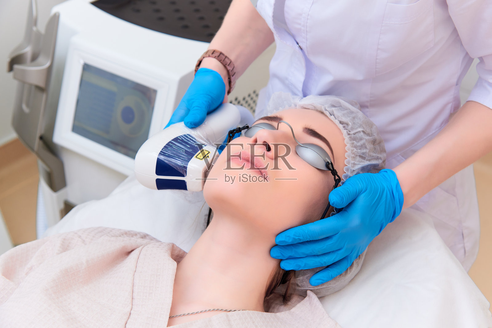 激光美容的临床应用。照片摄影图片