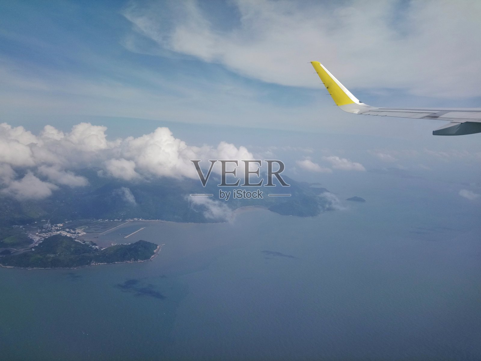 从飞机窗口观看照片摄影图片