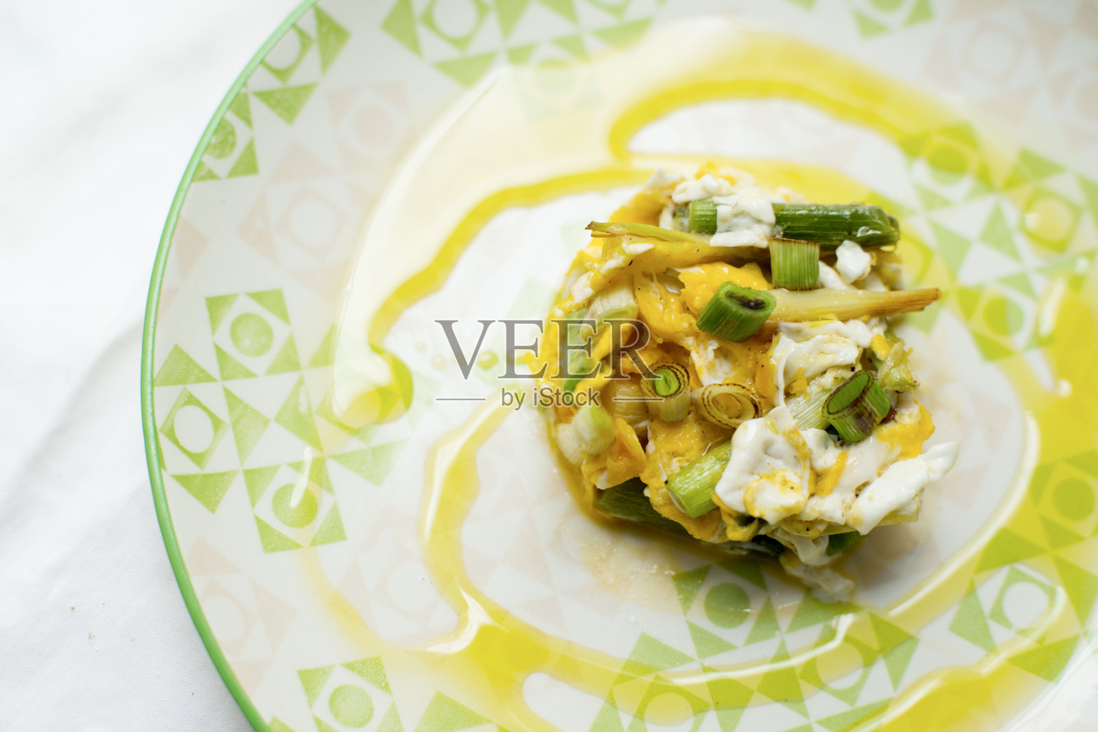 炒嫩蒜照片摄影图片