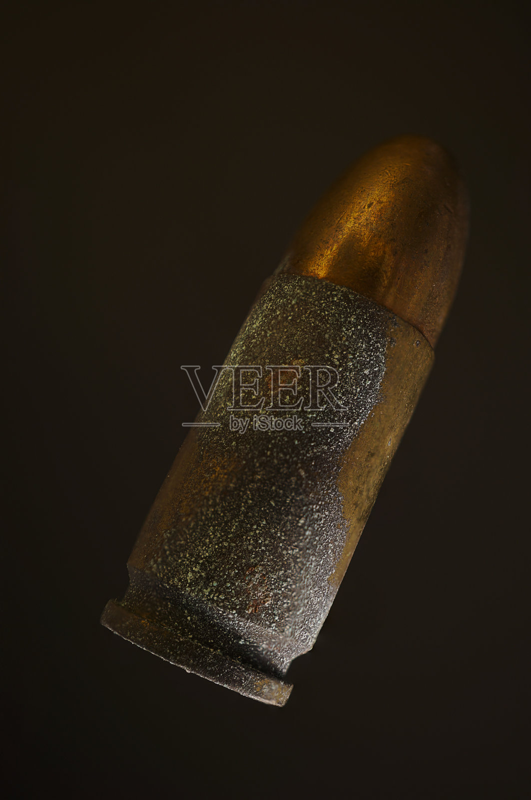 木制雕像艺术模型持有黄铜子弹照片摄影图片