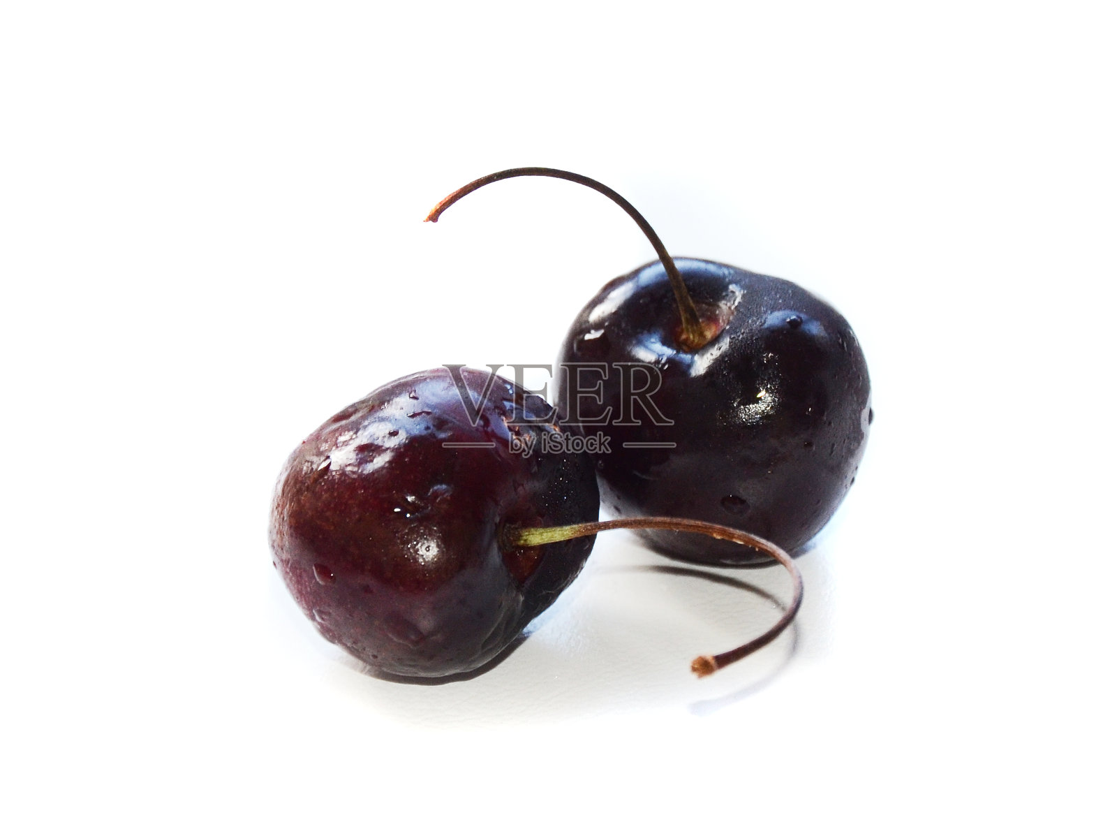 樱桃被孤立在白色的背景上。照片摄影图片