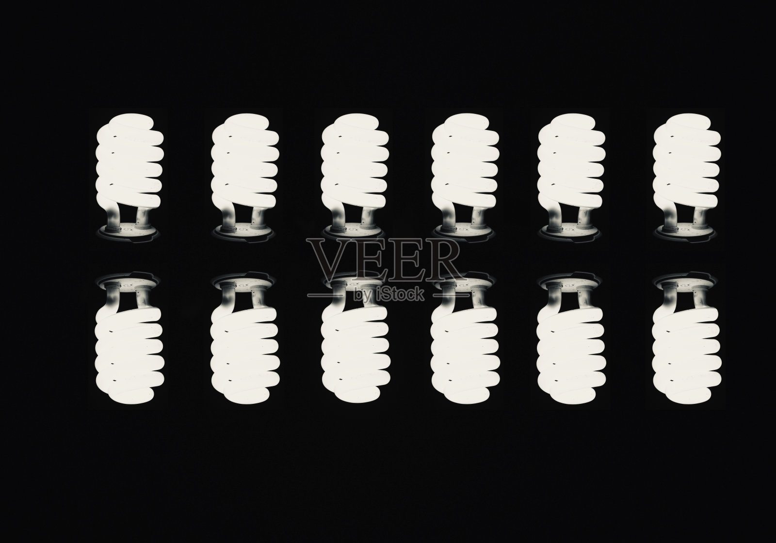 白色节能灯泡照片摄影图片