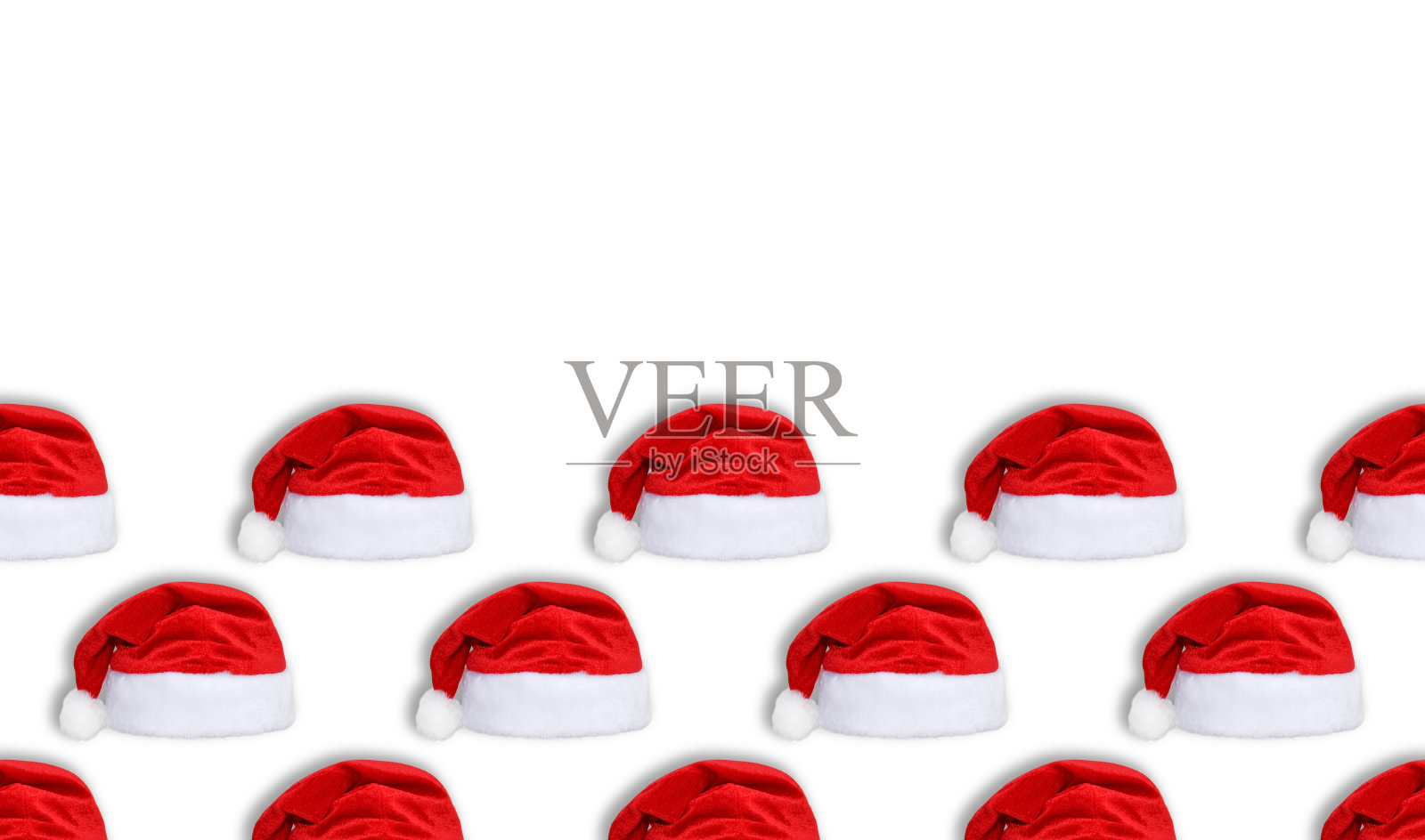 圣诞老人的红帽孤立在白色的背景上。红色圣诞帽或无缝年帽图案照片摄影图片