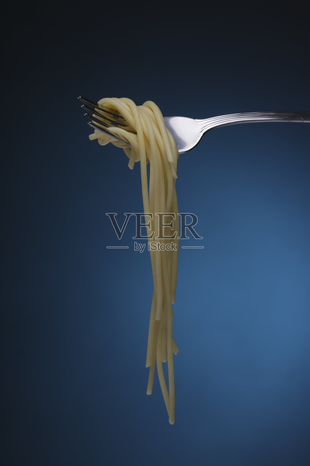 叉子上放意大利面照片摄影图片