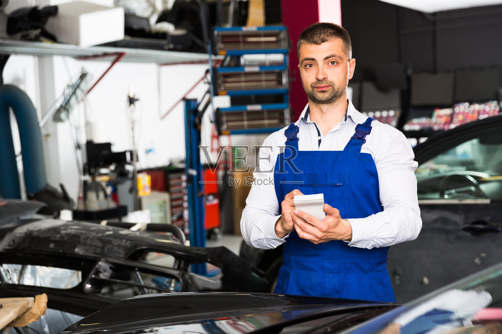 汽车修理工工作记录表照片摄影图片