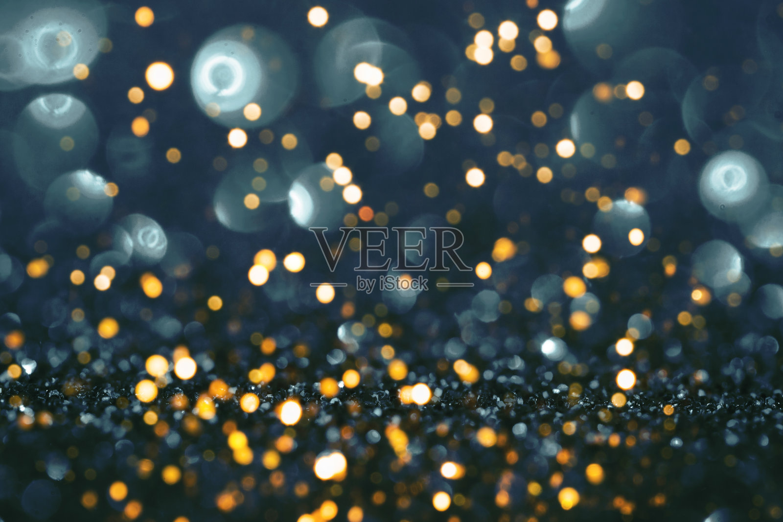 蓝色和金色背景与闪光照片摄影图片