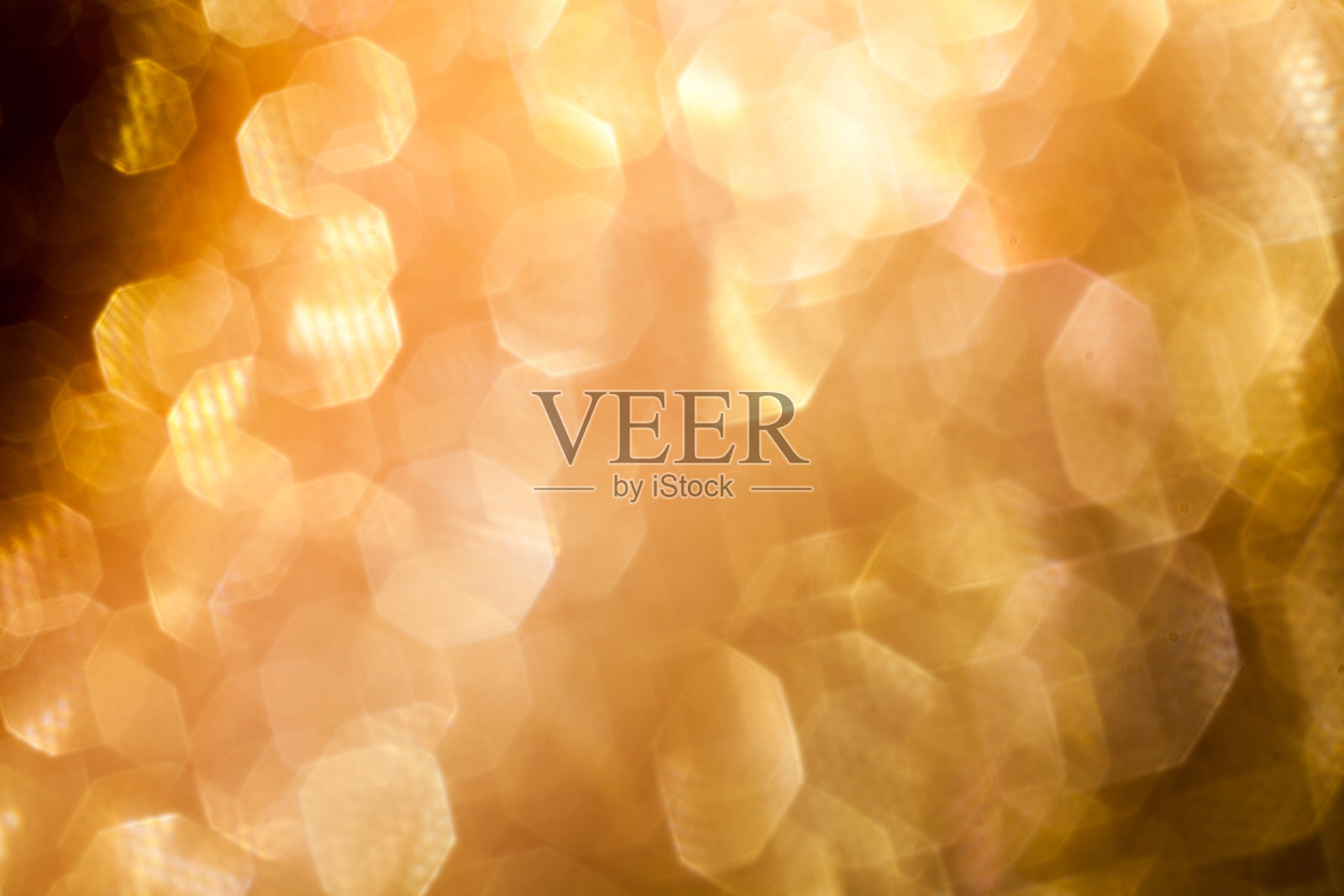 闪闪发光的黄金质地。新年的背景。照片摄影图片