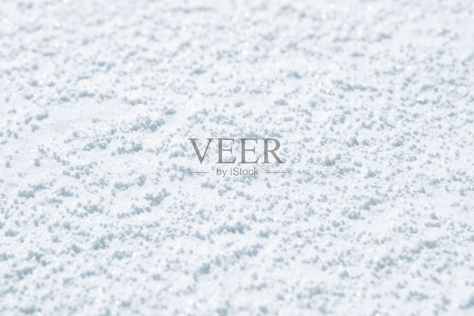 新鲜的雪背景纹理。冬天的背景有雪花和雪堆。雪块。照片摄影图片