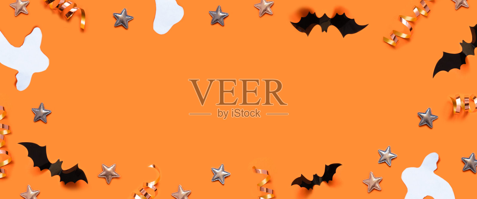 万圣节装饰框架蝙蝠，幽灵，蜘蛛网，星星在橙色的背景。照片摄影图片