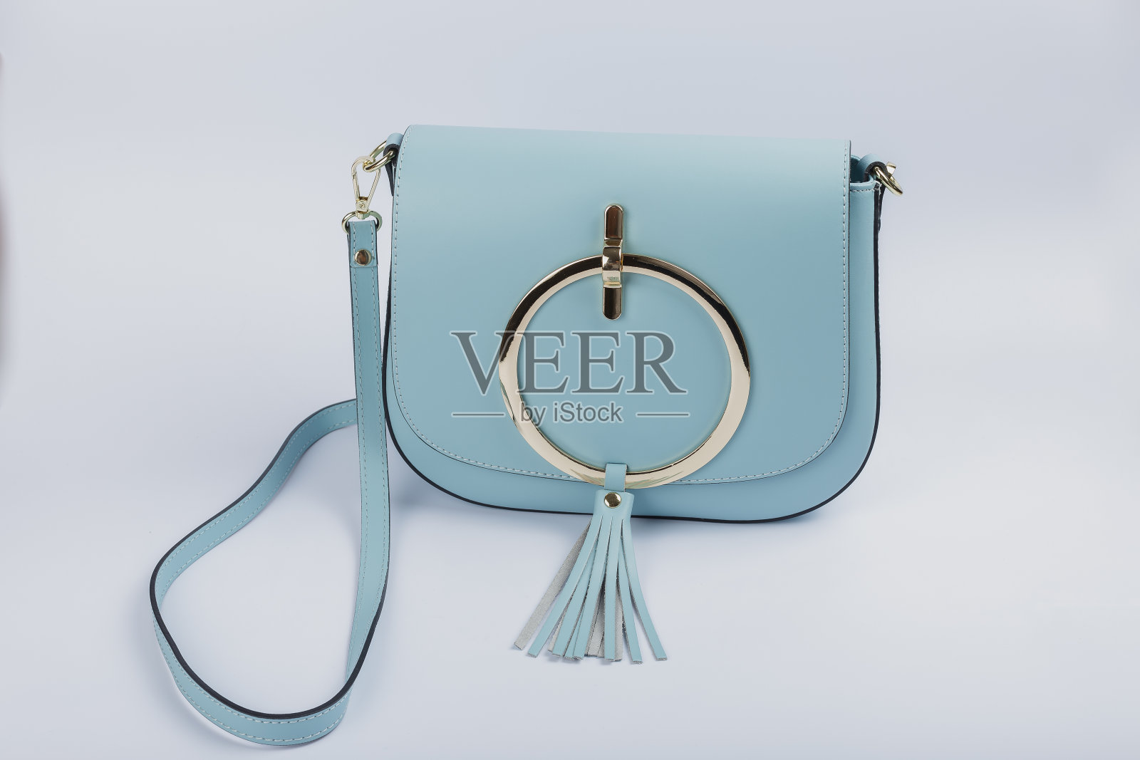 新款女性包在一个白色的背景，新的设计照片摄影图片