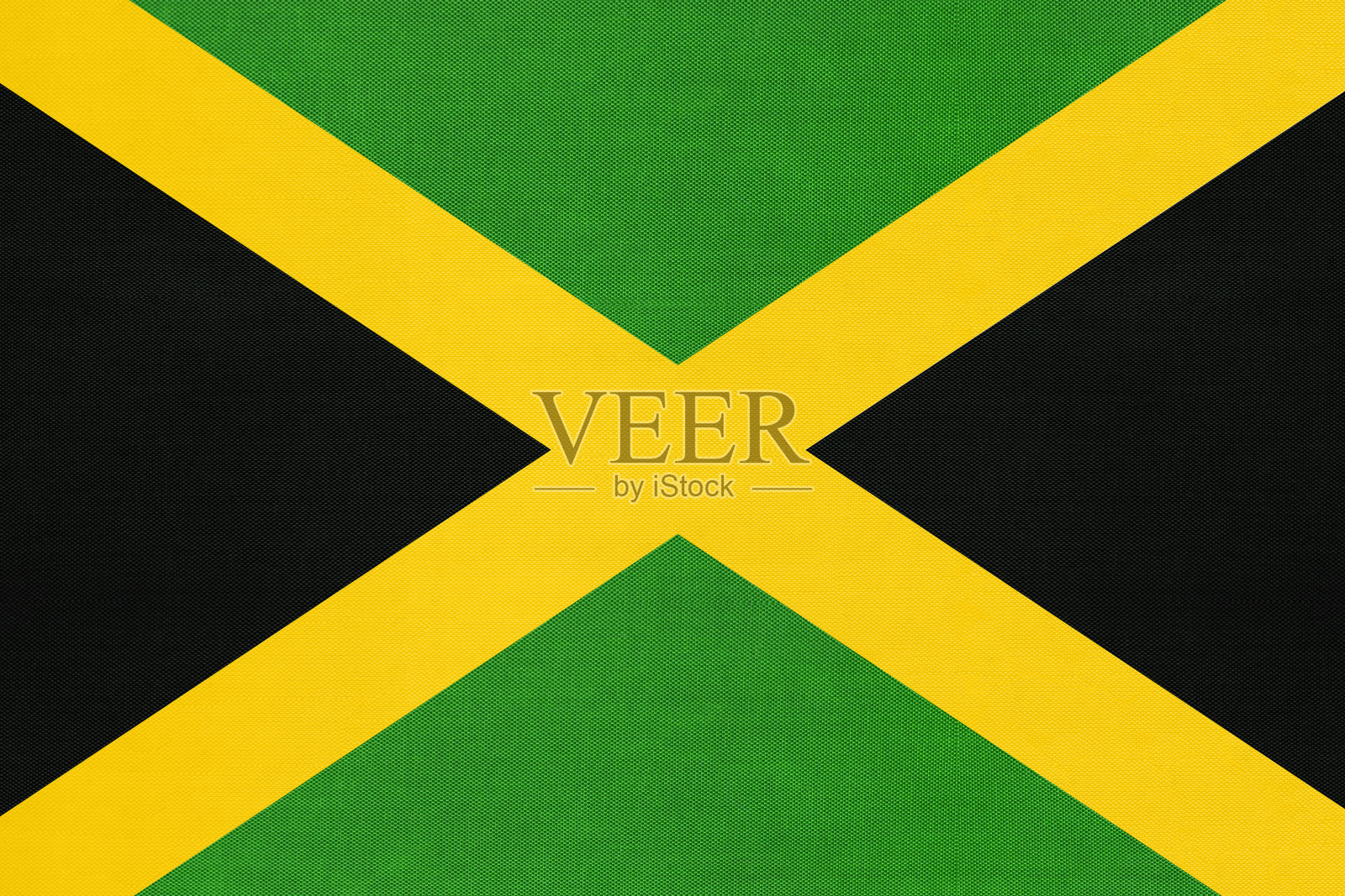 牙买加国旗织物，纺织背景。象征着北美世界的国家。照片摄影图片