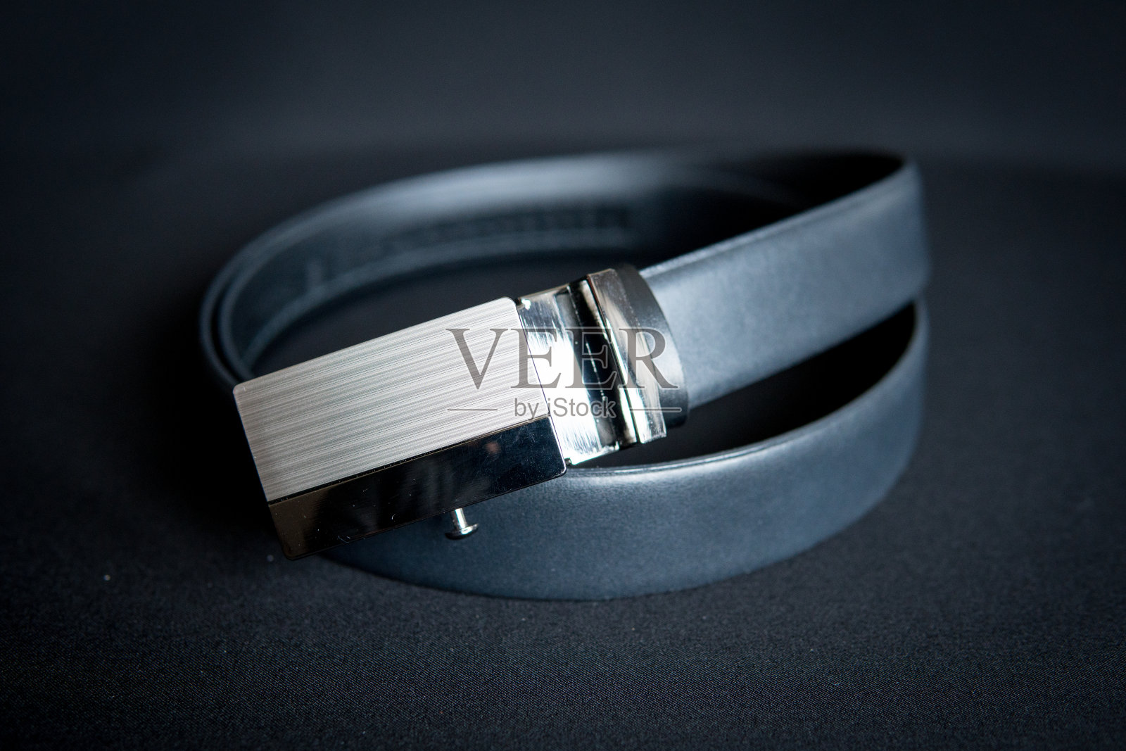 男士腰带的细节照片摄影图片