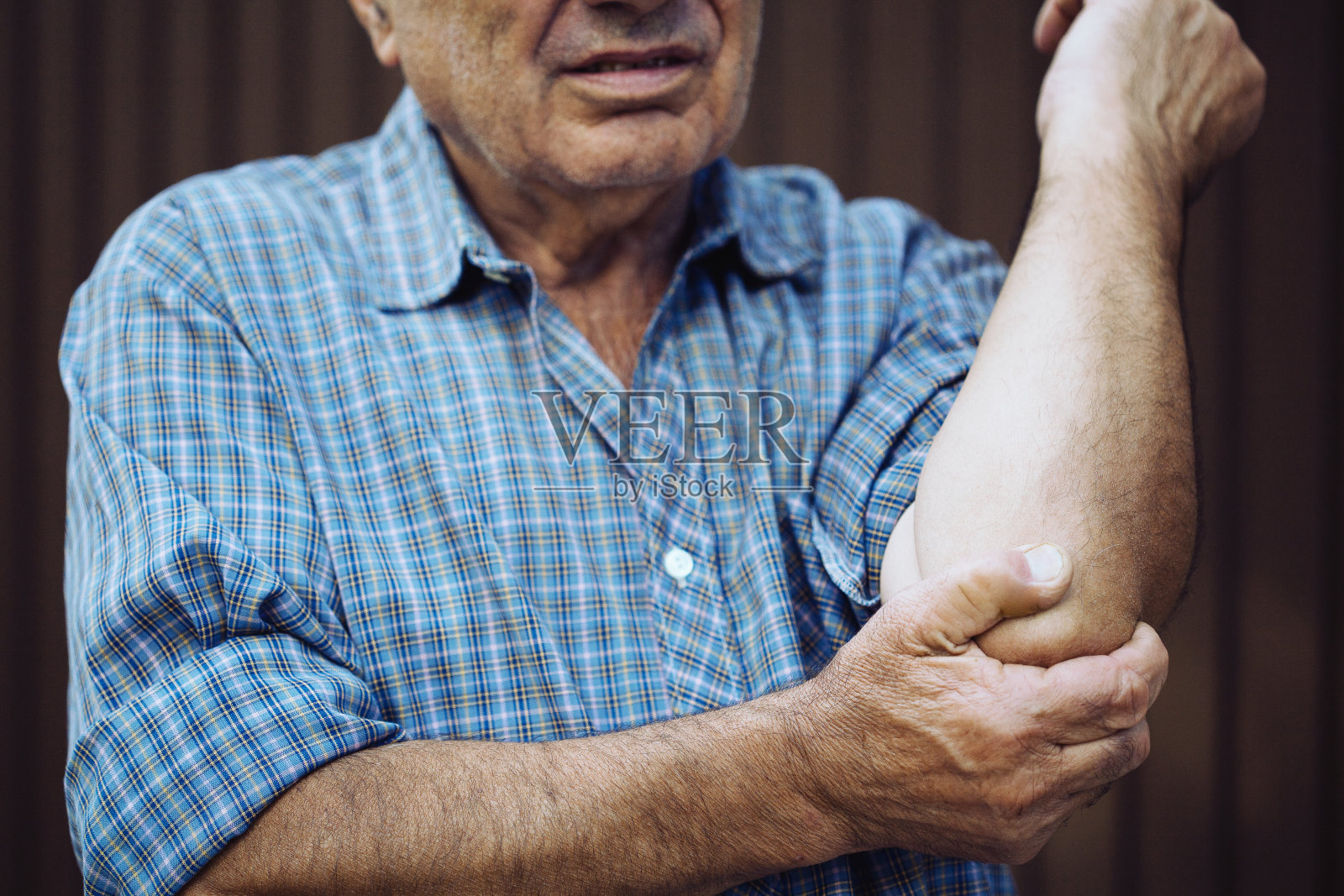 肘部疼痛照片摄影图片