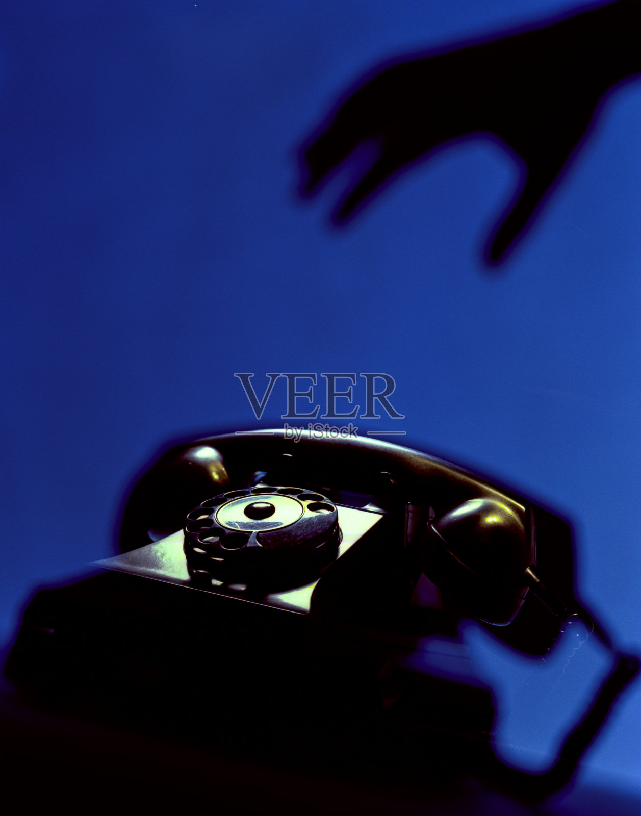 带手的老式手机照片摄影图片