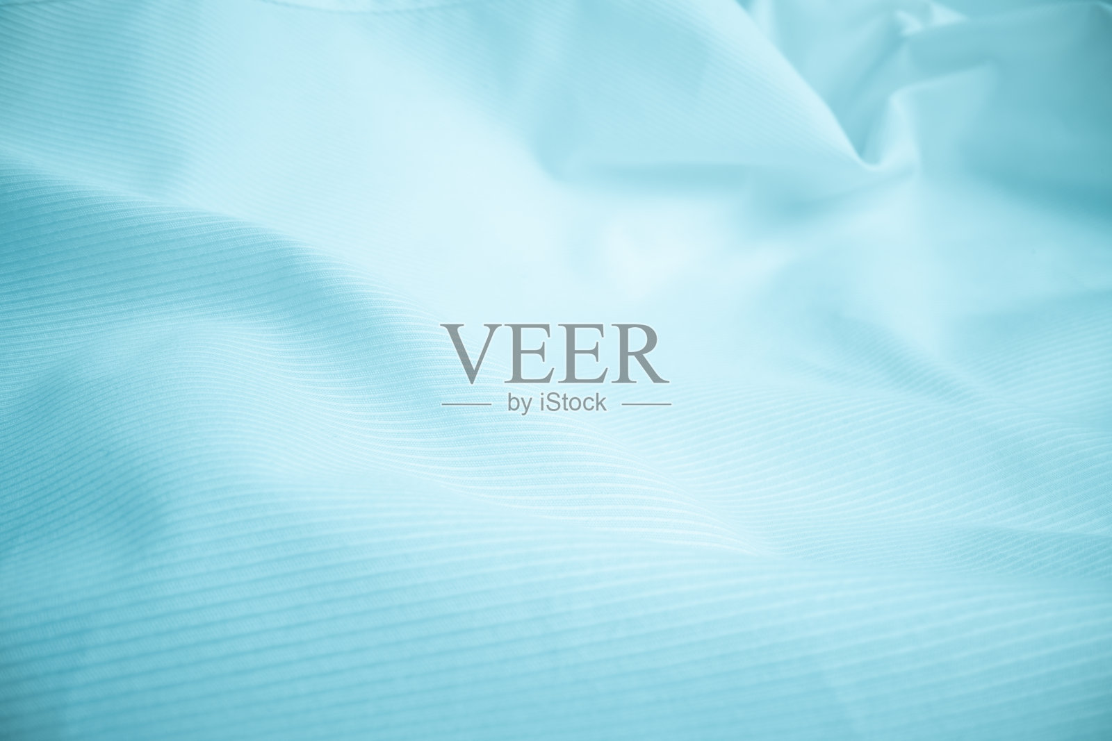 微距镜头中闪亮的布料纹理。照片摄影图片