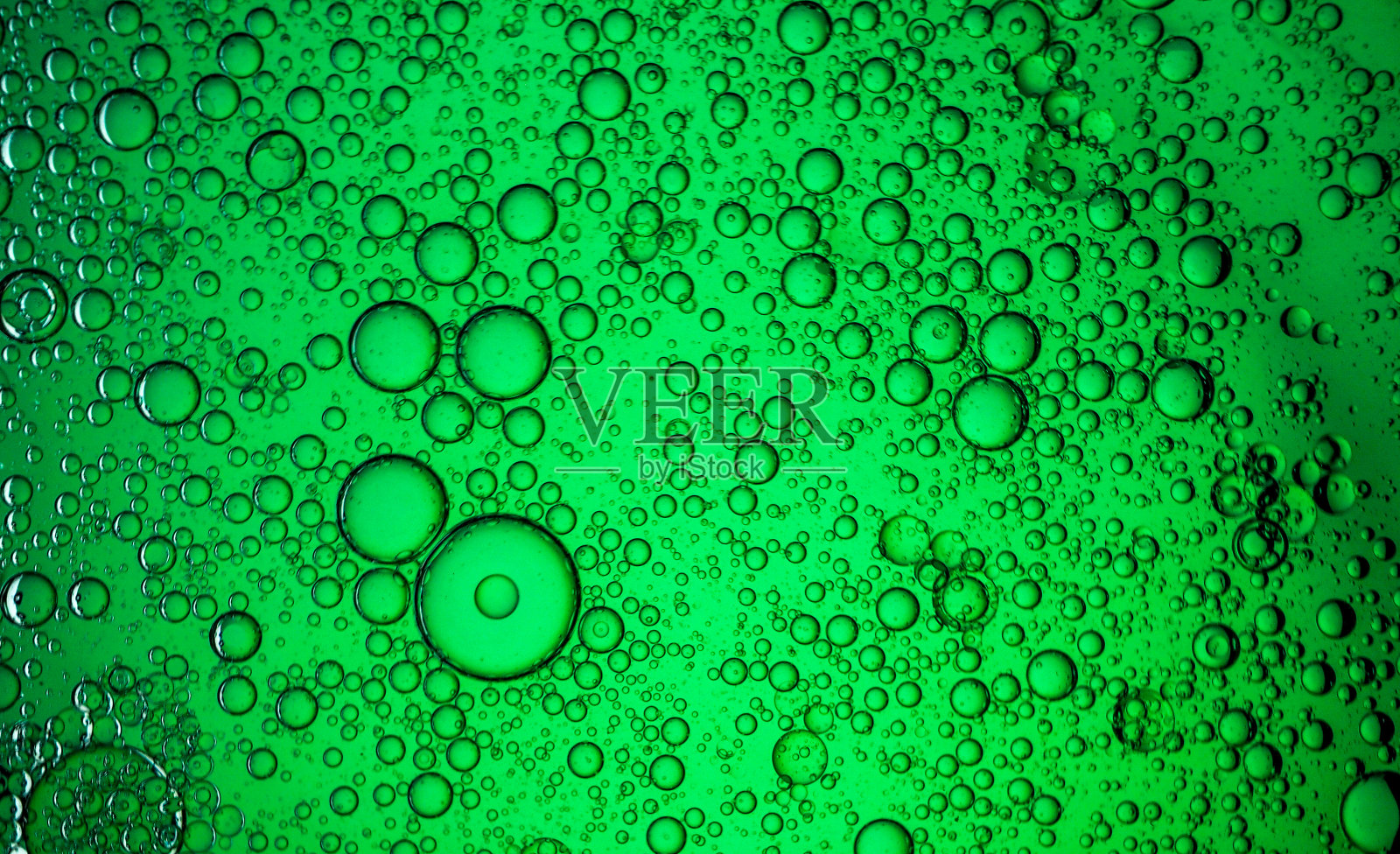 油滴在水面上-水气泡抽象光照明照片摄影图片