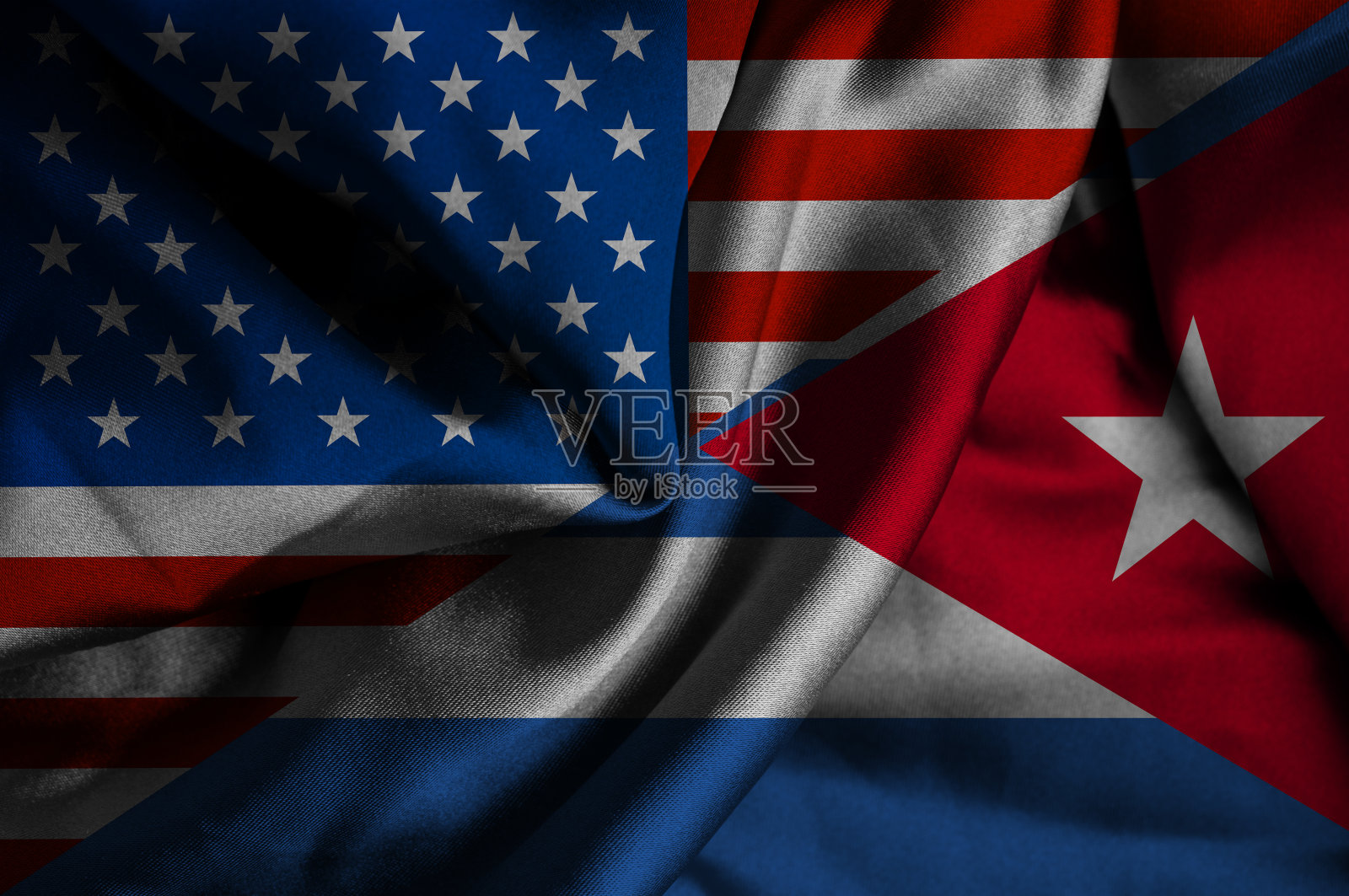 挥舞着古巴和美国的旗帜照片摄影图片