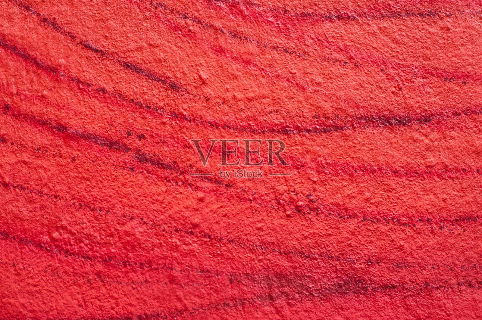 红色的画在墙上纹理照片摄影图片