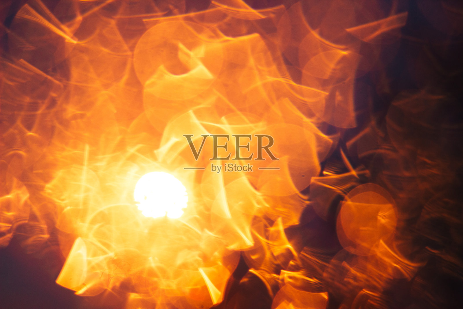 黑色背景上的金色散景照片摄影图片