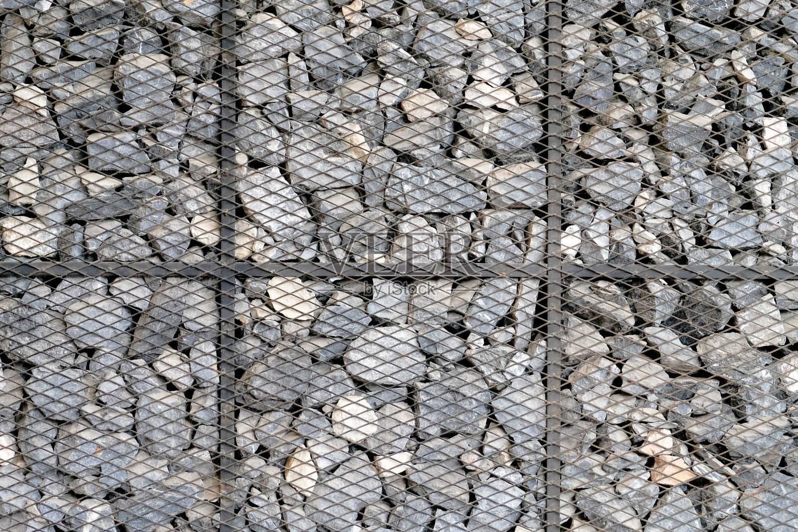 石墙以金属网箱为背景或纹理照片摄影图片