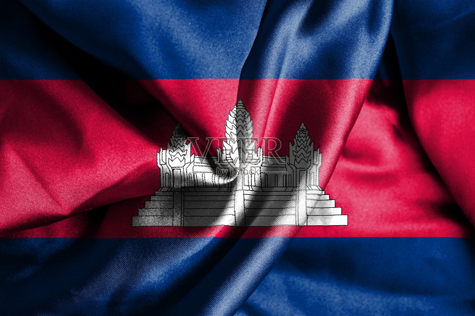 柬埔寨挥舞着国旗照片摄影图片